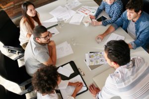 Team of creative professionals meeting in conference room